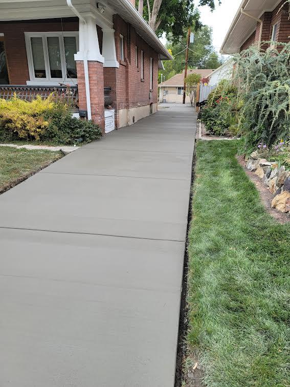 Concrete pad for a backyard pickleball court in Utah