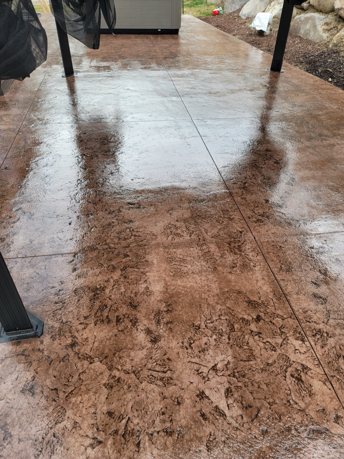 Stamped brown decorative concrete patio in Utah